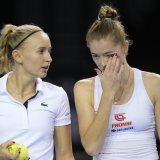 Jil Teichmann (à gauche) et Simona Waltert seront opposées vendredi à Iasi KEYSTONE/AP/KIN CHEUNG